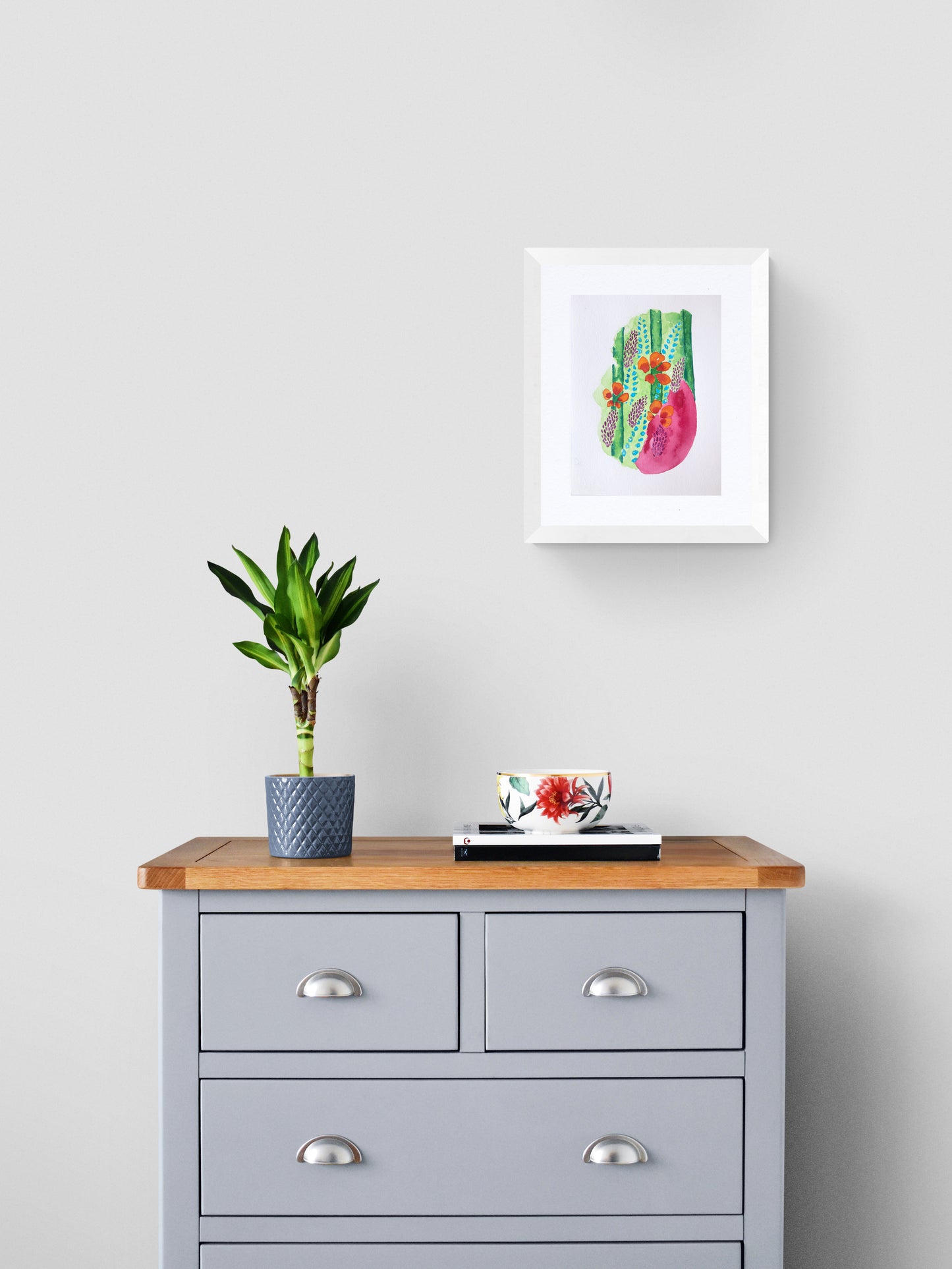 floral immortal original framed watercolour painting displayed on bedroom wall